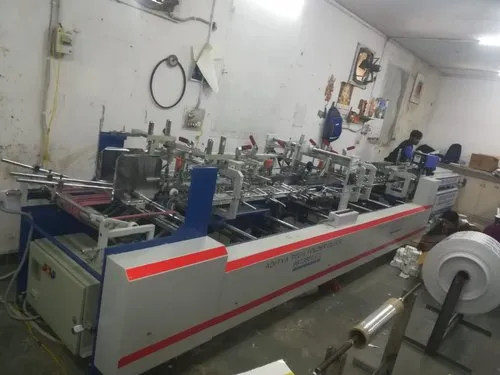 Corrugated Carton Pasting Machine Manufactured by Aditya Tech India